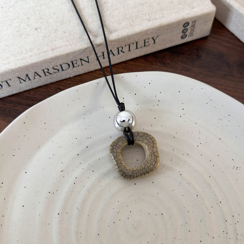 สร้อยคอเครื่องประดับกระดูกอูฐเรขาคณิต