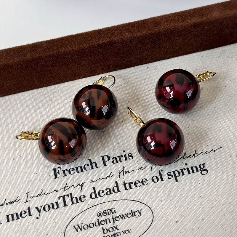 Сережки-кульки з леопардовим принтом