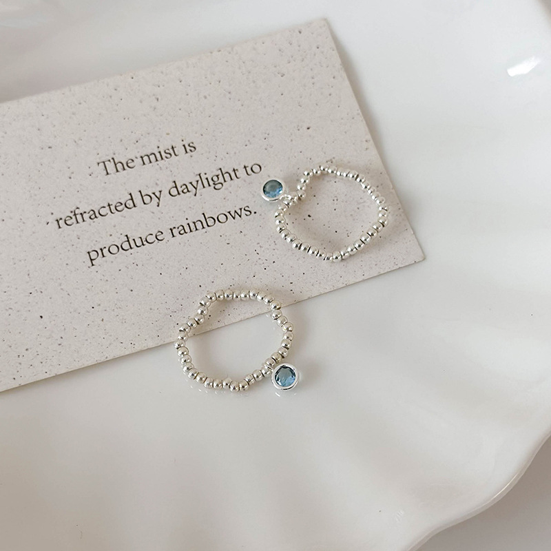 Синій еластичний перстень з кришталевими намистинами