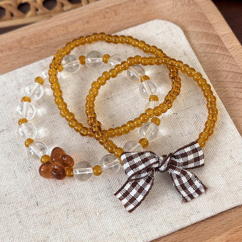 Σύνολο Ρυθμιζόμενων Βραχιόλιων με Χάντρες και Φιόγκο