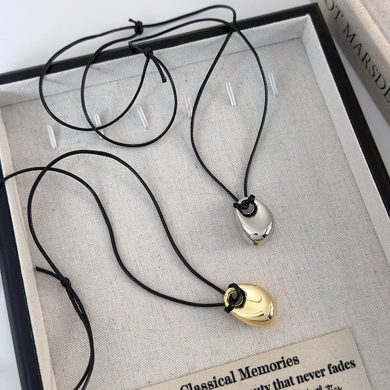 Геометричний кулон-біб