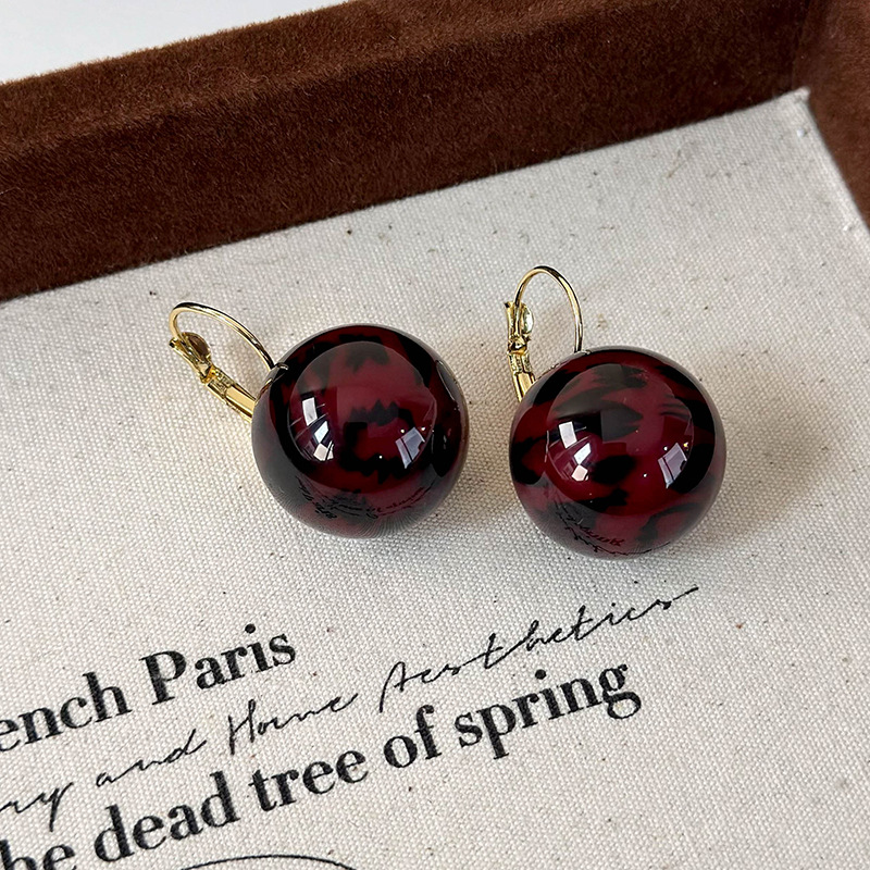 Сережки-кульки з леопардовим принтом