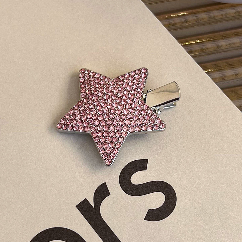 Боковая заколка с розовым стразами в виде сердца