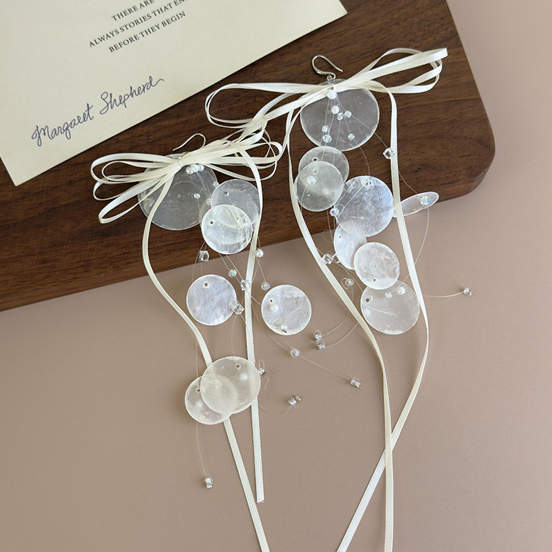 컨버터블 보우 셸 태슬 귀걸이