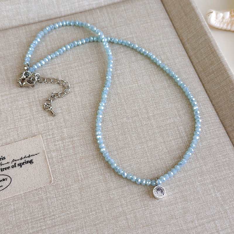 Блакитне намисто з мушлями та намистинами