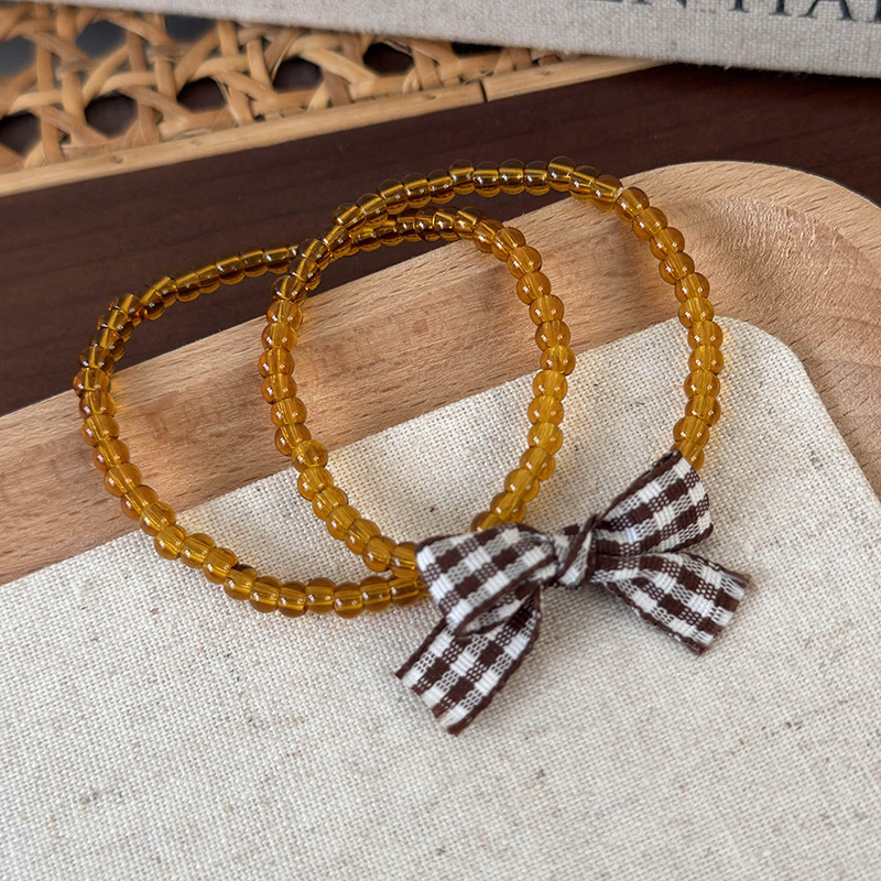 Σύνολο Ρυθμιζόμενων Βραχιόλιων με Χάντρες και Φιόγκο