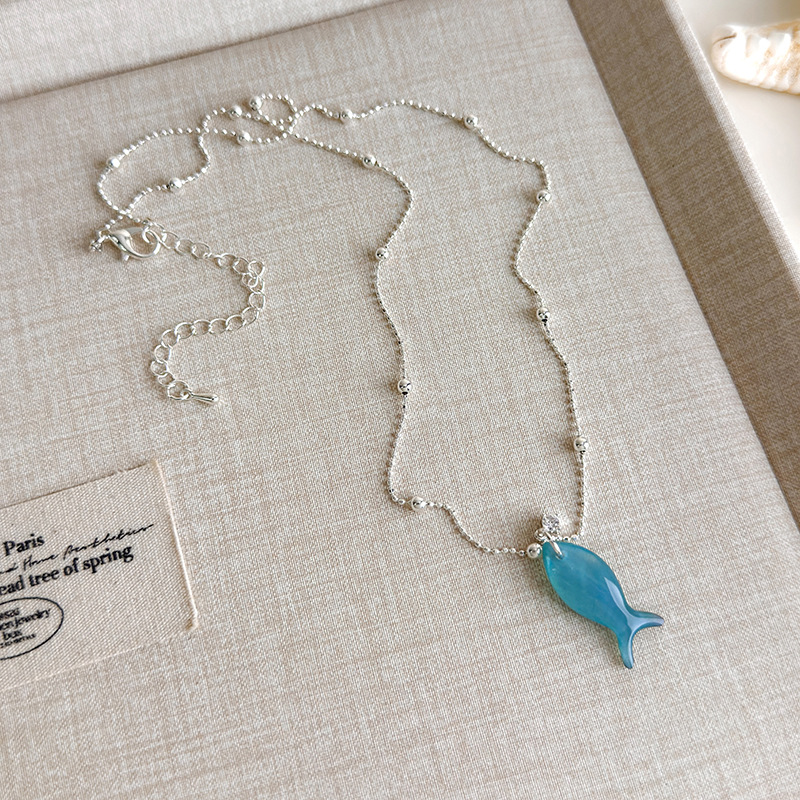 Блакитне намисто з мушлями та намистинами