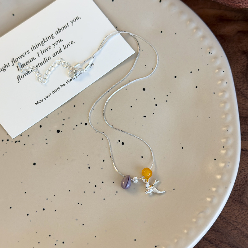 قلادة خرز زجاجي أصفر مكدس