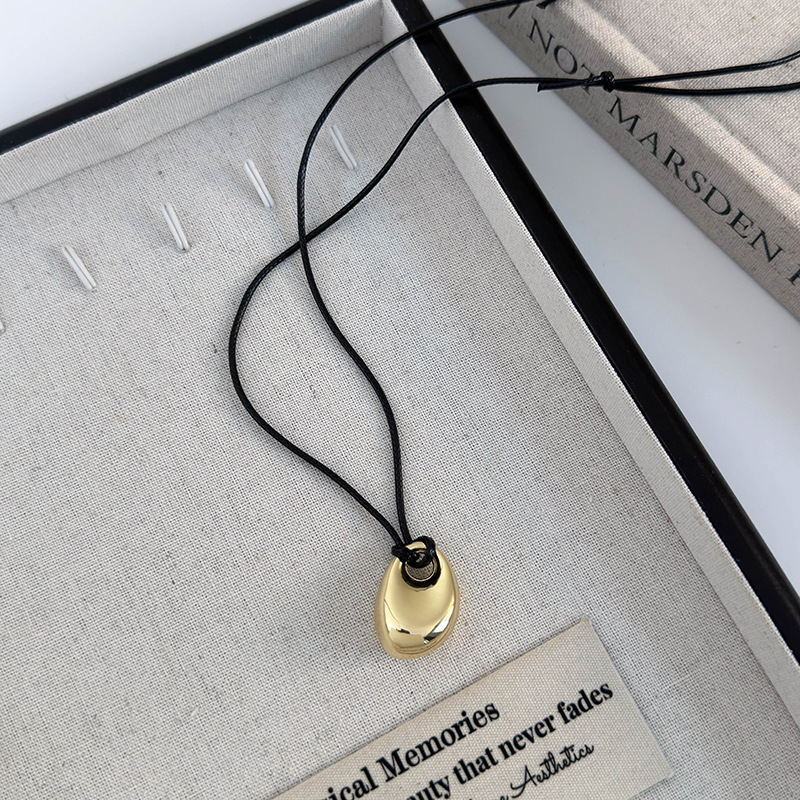 Геометричний кулон-біб