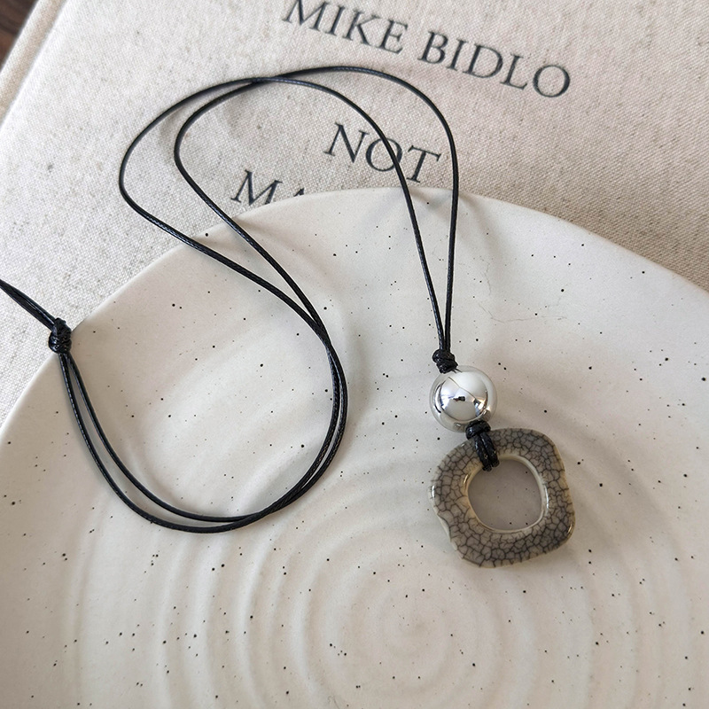 สร้อยคอเครื่องประดับกระดูกอูฐเรขาคณิต