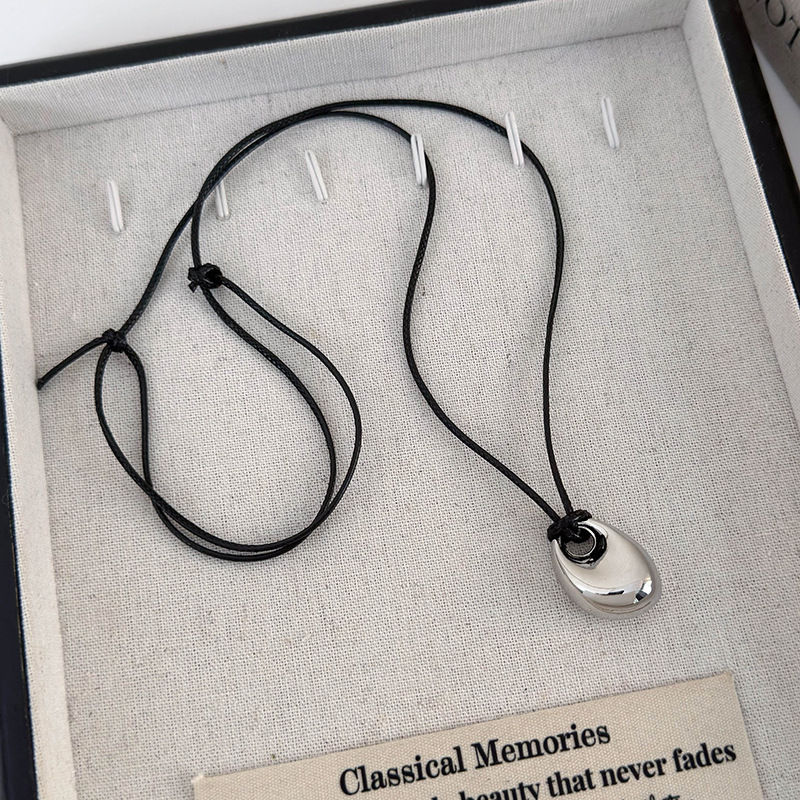 Геометричний кулон-біб