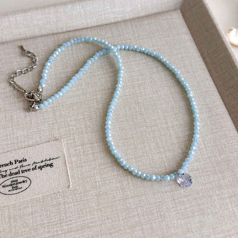 Блакитне намисто з мушлями та намистинами