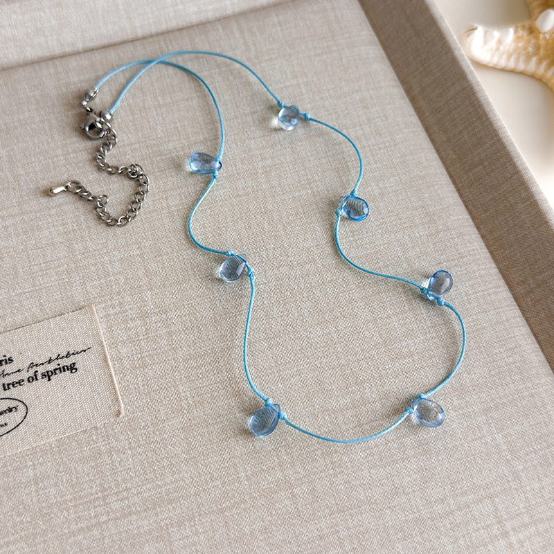 Блакитне намисто з мушлями та намистинами