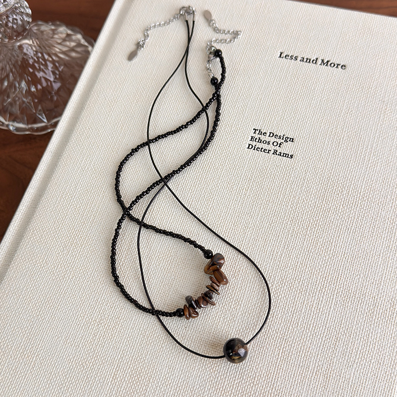 Чорне геометричне намисто з намистинами Тигрове Око