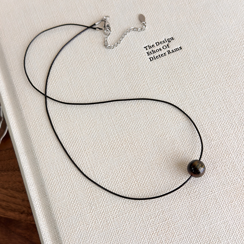 Чорне геометричне намисто з намистинами Тигрове Око