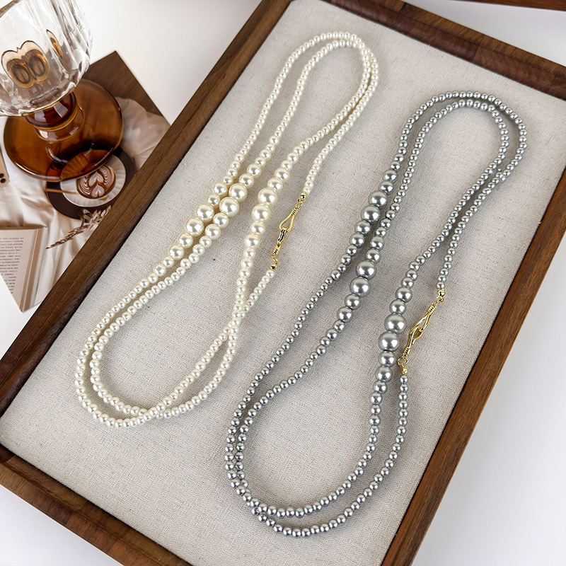 สร้อยคอไข่มุกไล่ระดับสียาว