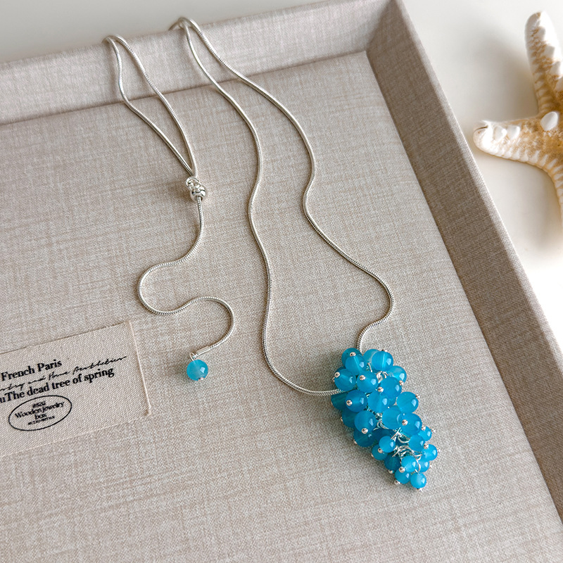 Блакитне намисто з мушлями та намистинами