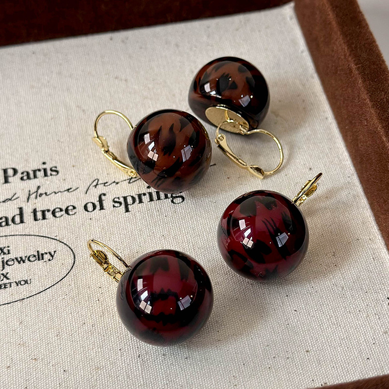 Сережки-кульки з леопардовим принтом