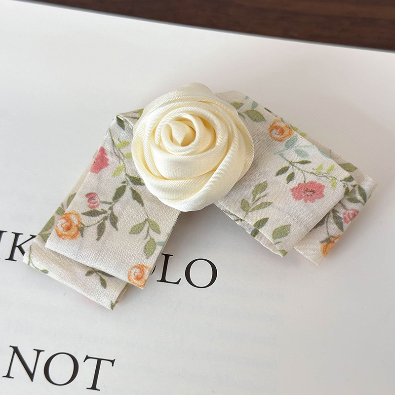 Цветочная заколка-уточка с розовым бантом