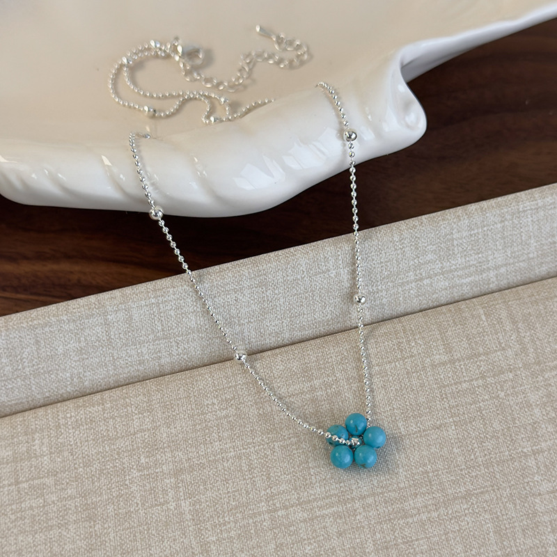 Багатошарове намисто з бісерними квітами та блакитним каменем