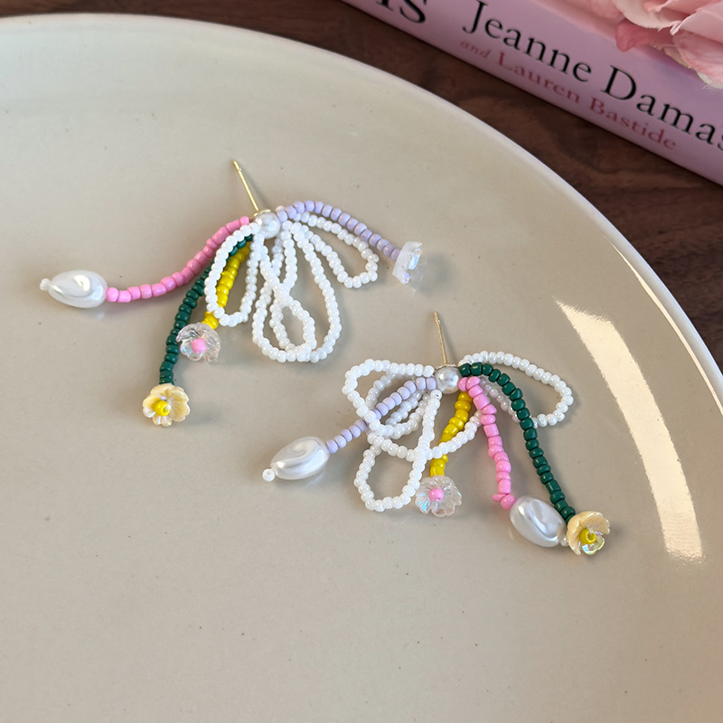 Orecchini a Fiocco e Nappe con Perline