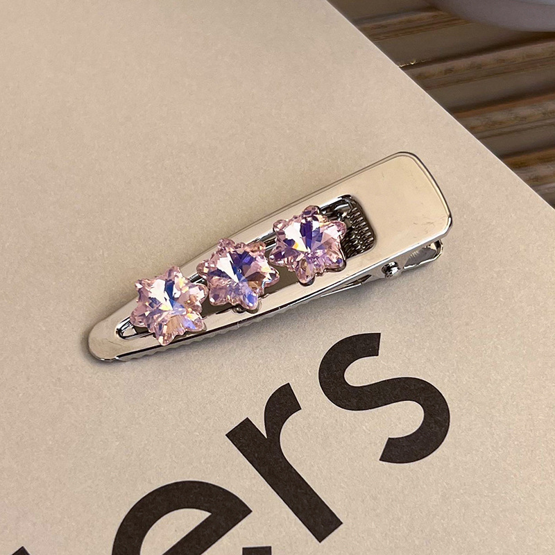 Боковая заколка с розовым стразами в виде сердца