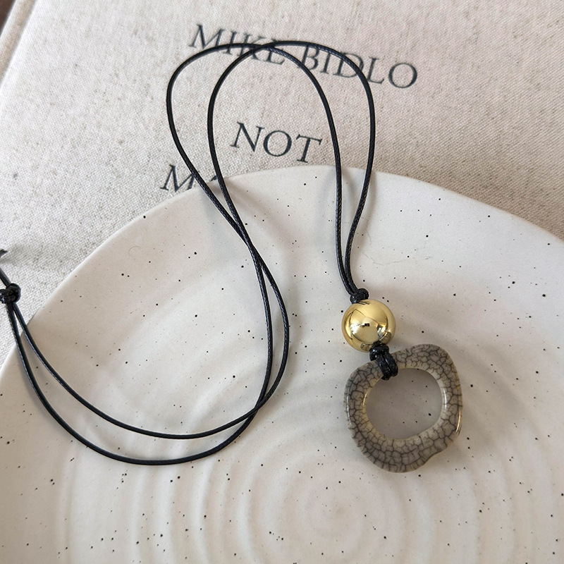 สร้อยคอเครื่องประดับกระดูกอูฐเรขาคณิต