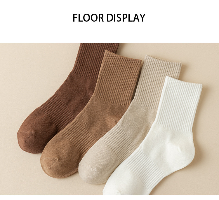 ถุงเท้ากีฬา Mid-Calf สีทึบ