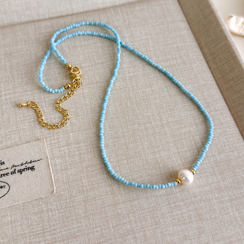 Блакитне намисто з мушлями та намистинами