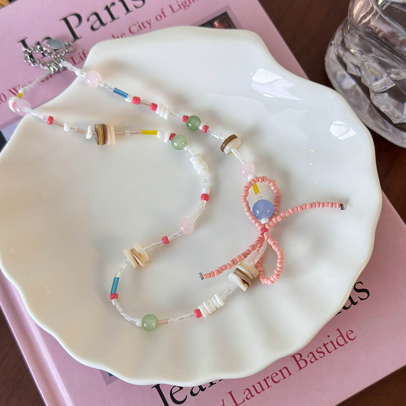 สร้อยคอแพนด้นต์โบว์และเปลือกหอย