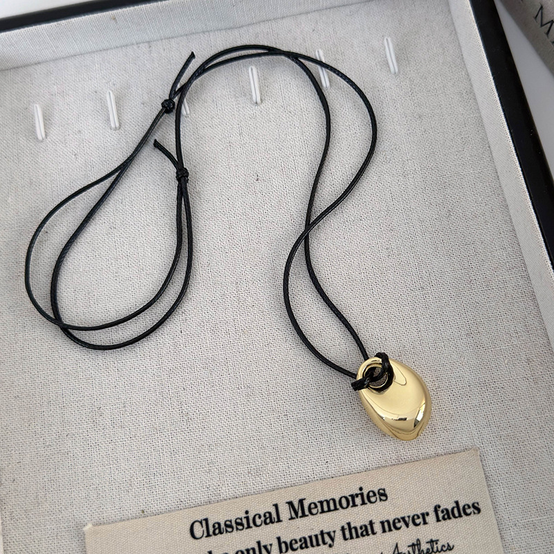 Геометричний кулон-біб