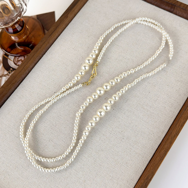 สร้อยคอไข่มุกไล่ระดับสียาว