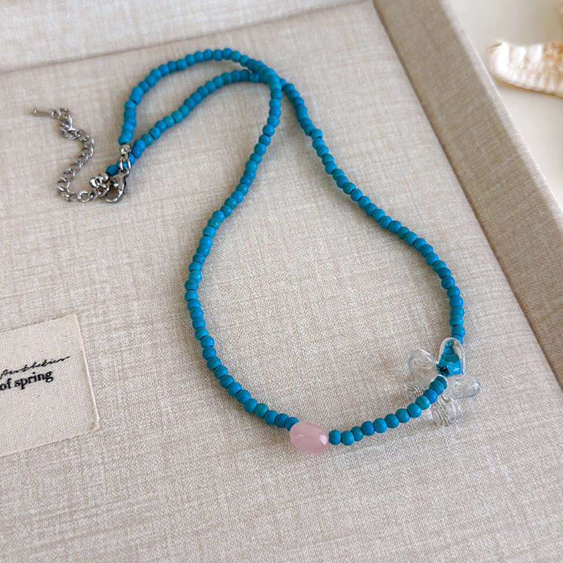 Блакитне намисто з мушлями та намистинами