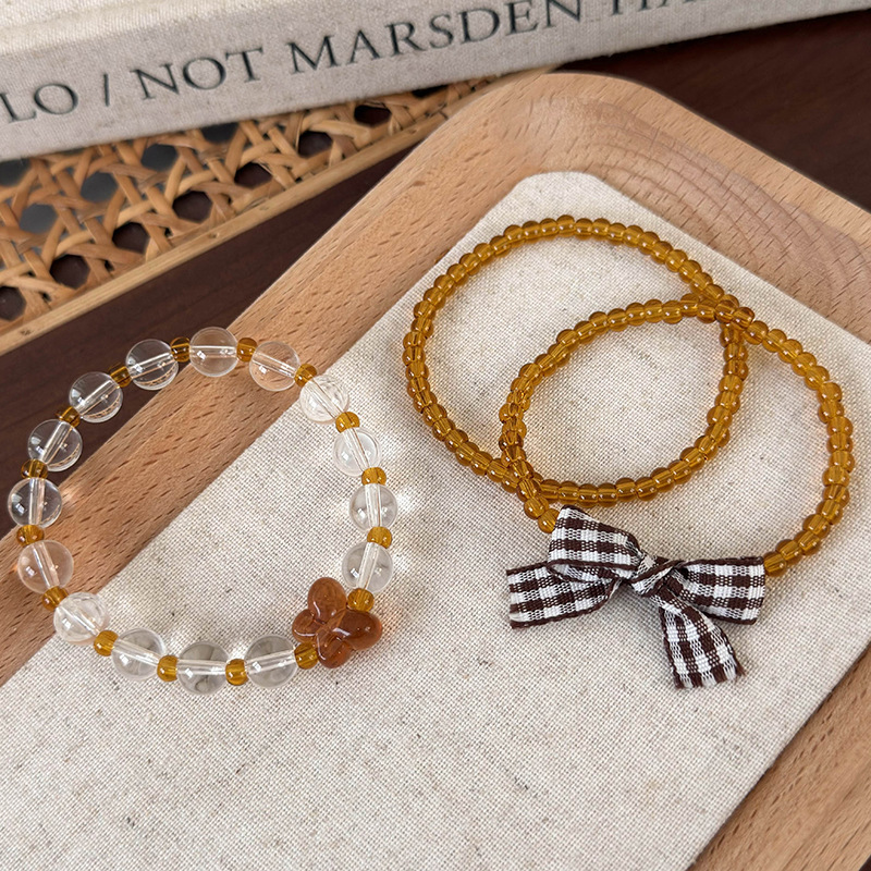 Σύνολο Ρυθμιζόμενων Βραχιόλιων με Χάντρες και Φιόγκο