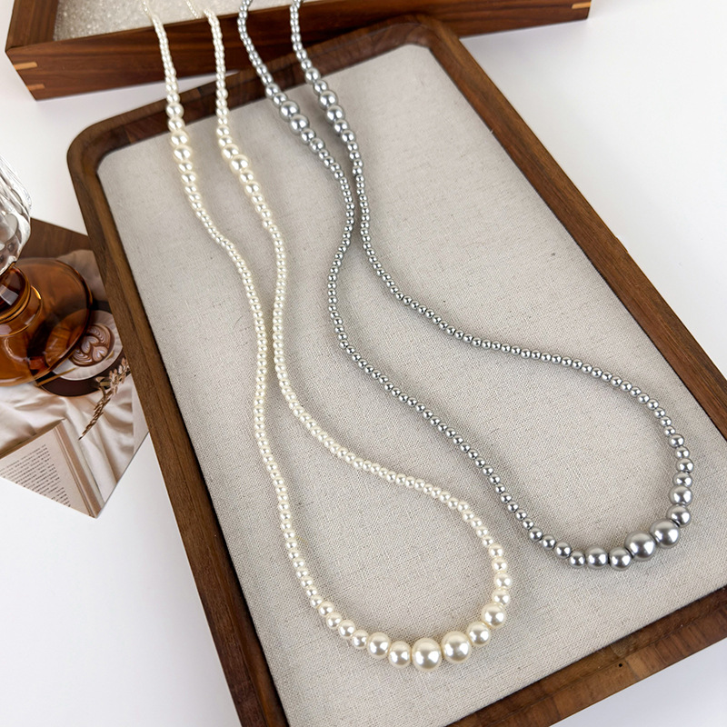 สร้อยคอไข่มุกไล่ระดับสียาว