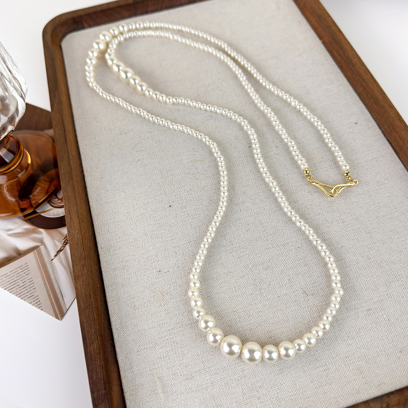 สร้อยคอไข่มุกไล่ระดับสียาว