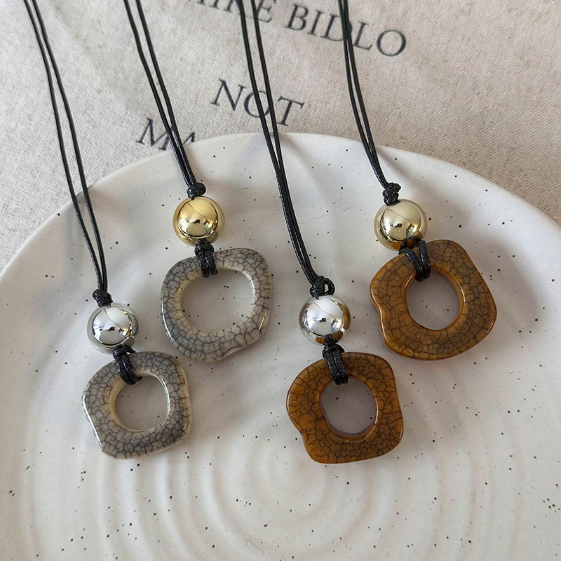 สร้อยคอเครื่องประดับกระดูกอูฐเรขาคณิต