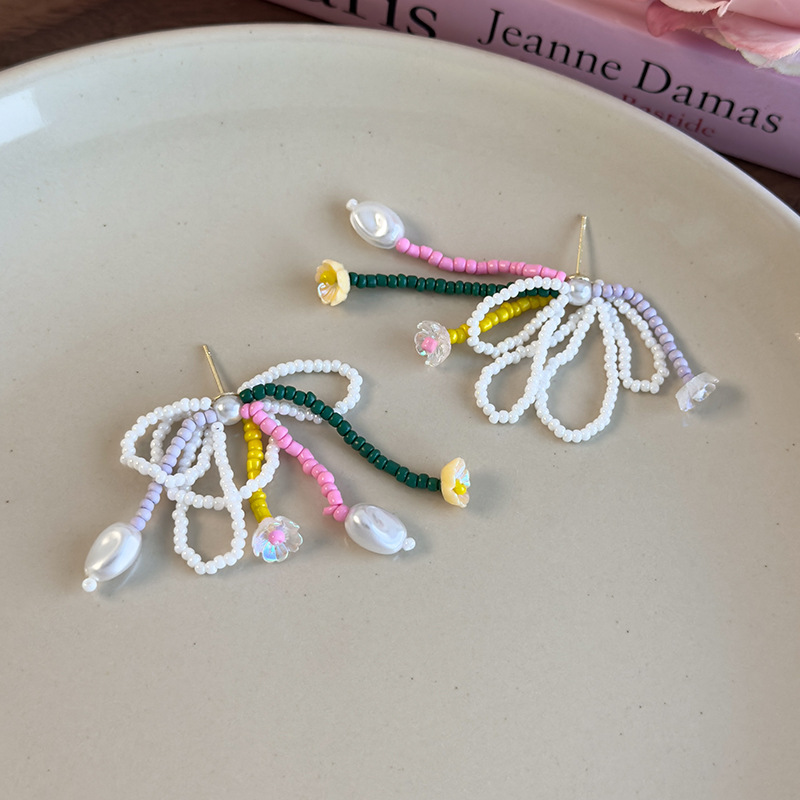 Orecchini a Fiocco e Nappe con Perline