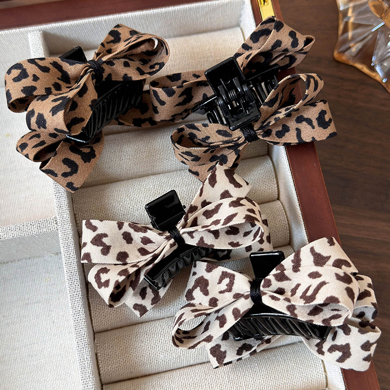 Agravă pentru păr cu fundiță leopard