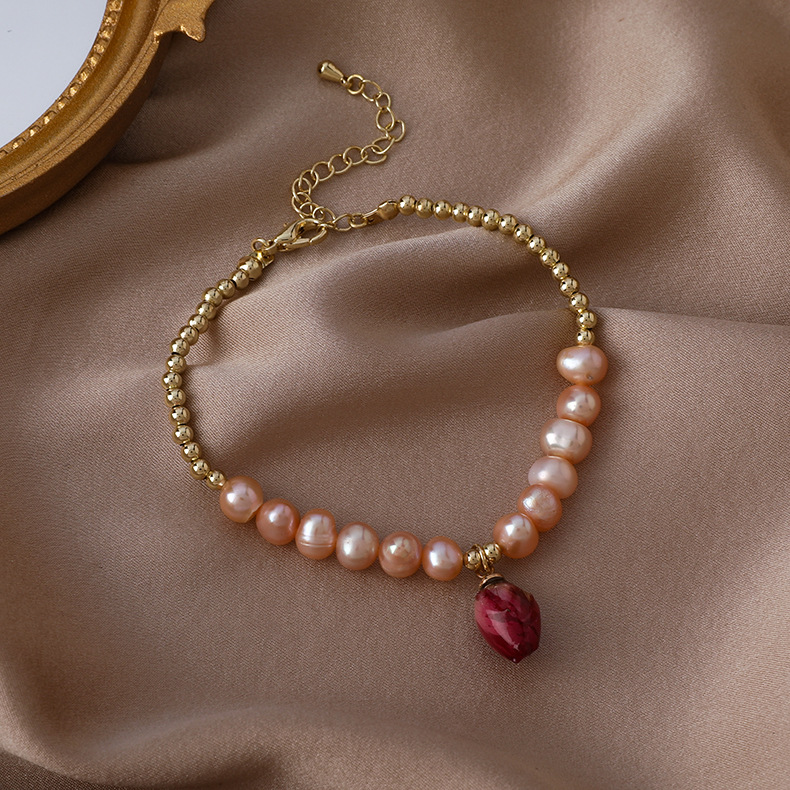 Набір браслета та намиста з консервованою трояндою