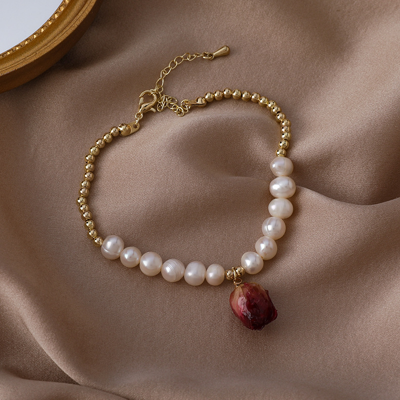 Набір браслета та намиста з консервованою трояндою