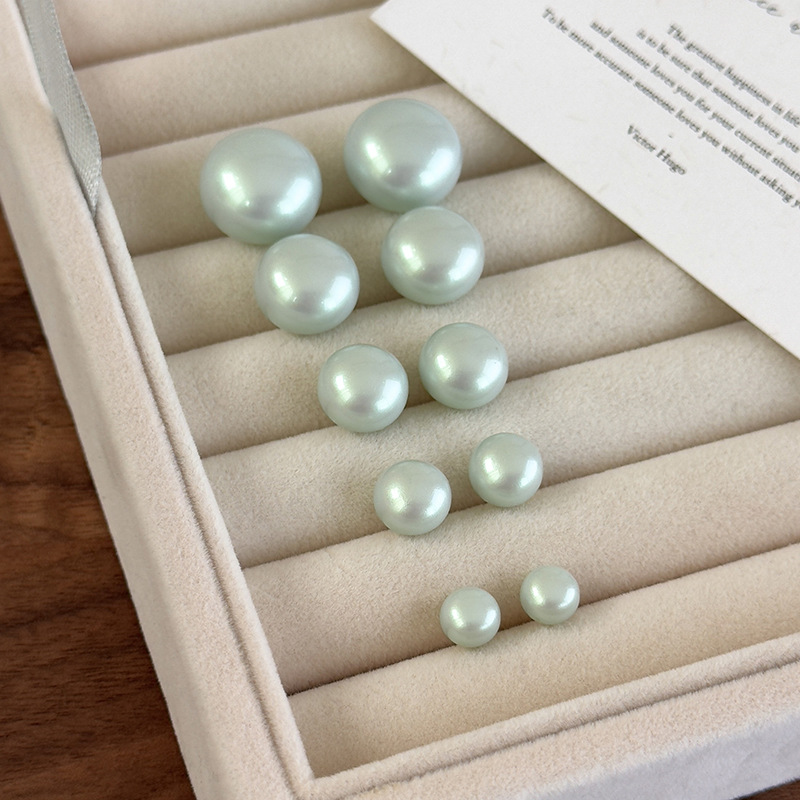 أقراط لؤلؤية خضراء نعناعية هندسية