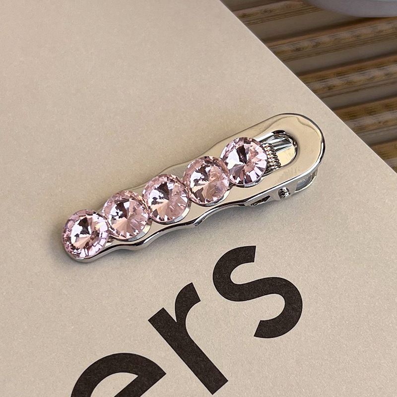 Боковая заколка с розовым стразами в виде сердца