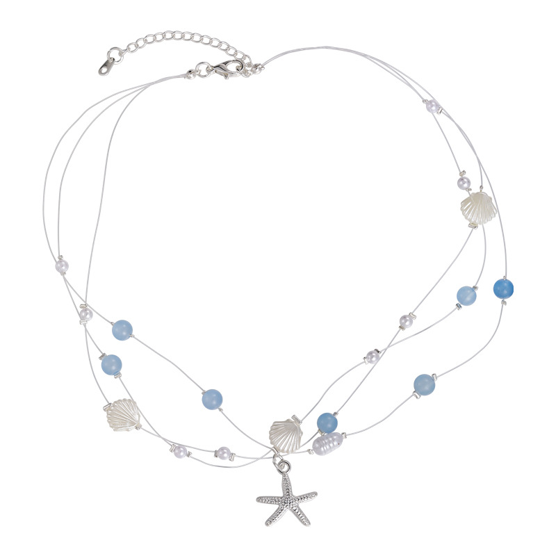 Намисто з блакитними кришталевими намистинами в морській тематиці