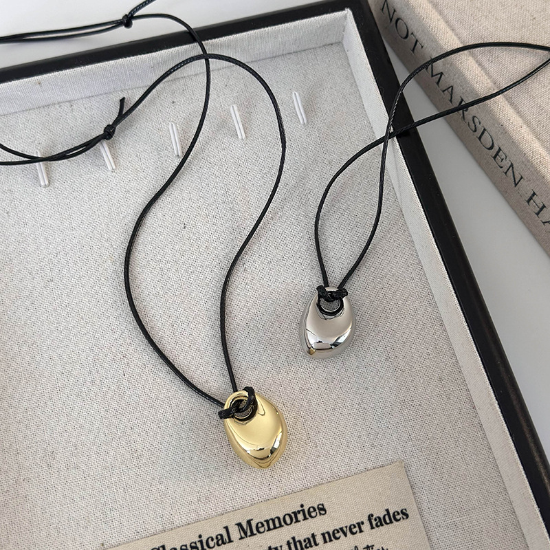 Геометричний кулон-біб