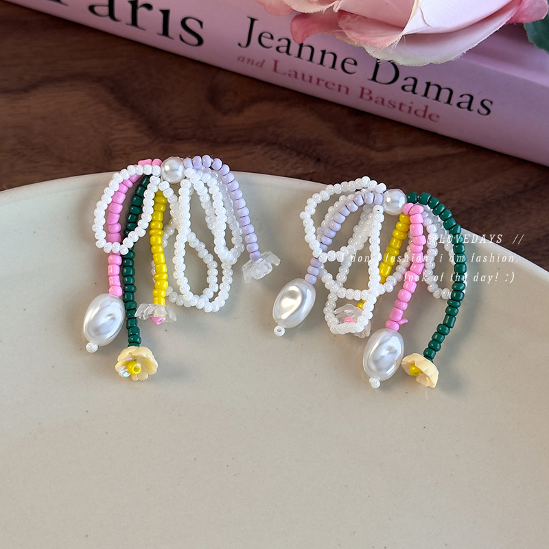 Orecchini a Fiocco e Nappe con Perline