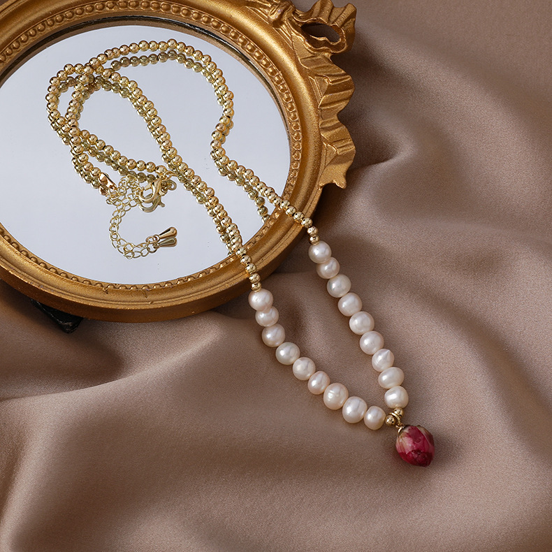 Набір браслета та намиста з консервованою трояндою