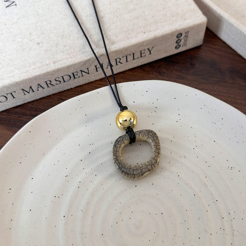 สร้อยคอเครื่องประดับกระดูกอูฐเรขาคณิต