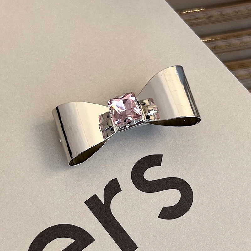 Боковая заколка с розовым стразами в виде сердца