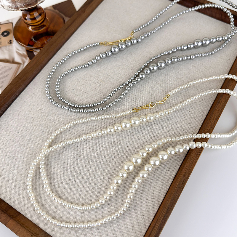 สร้อยคอไข่มุกไล่ระดับสียาว